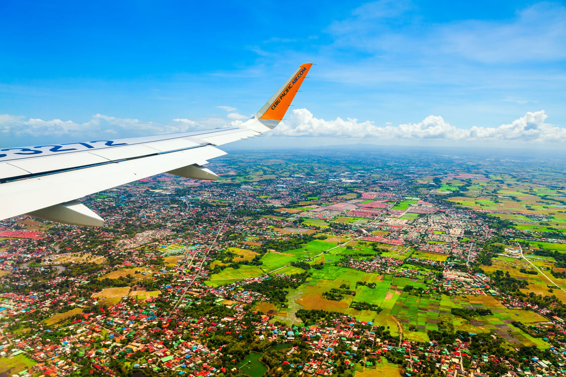 Cebu Pacific airplane above Manila, Philippines